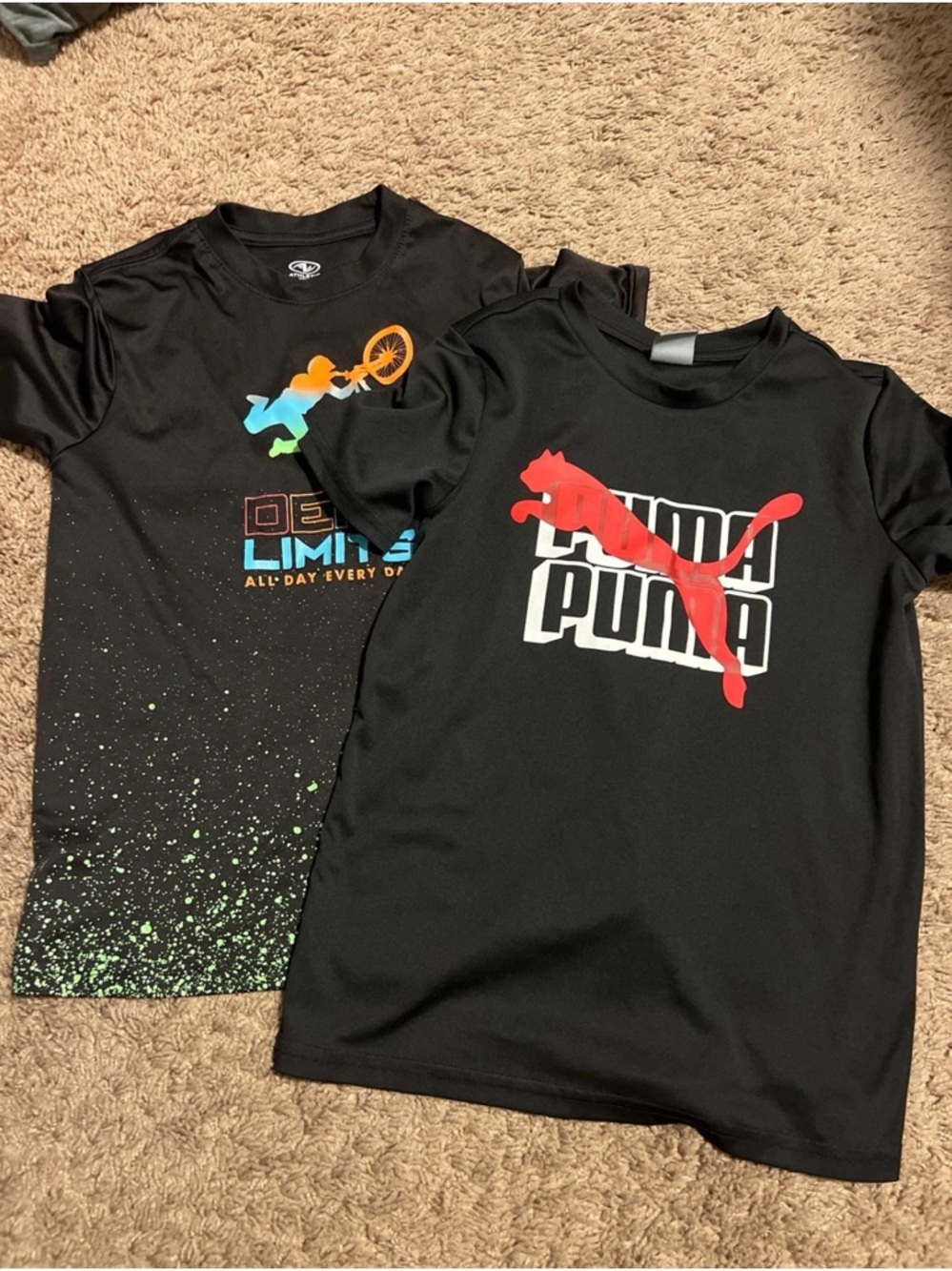 PUMA Black Short-Sleeve Tee with Red Logo and Multicolor Graphic